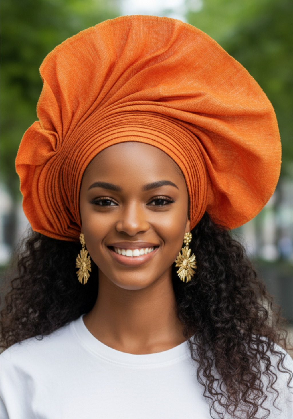 Orange Aso Oke Autogele pre-tied crown head wrap with tight pleats and 6-inch fan flare, jean-like texture, velcro closure.