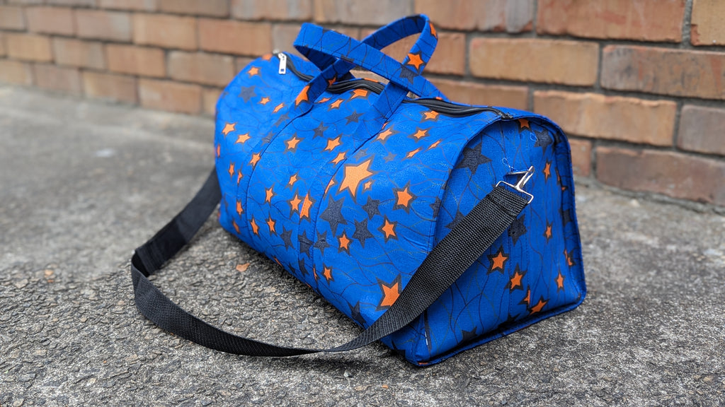 Abrafor hand-made Cotton Royal Blue, Orange, and Black African Print Ankara Travel Duffle bag-DPAPBBOB4