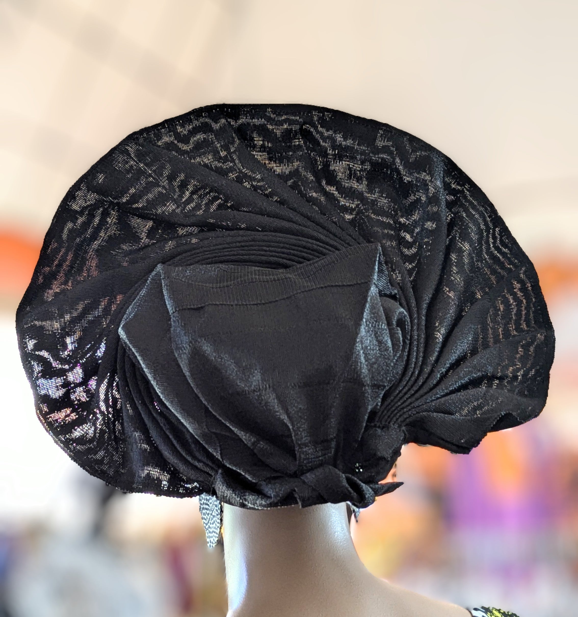 All black aso oke Gele women