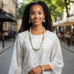  Ivory and gold African beads necklace, bracelet, and earrings set by Dupsie’s African Fashion – authentic African jewelry for weddings and celebrations.