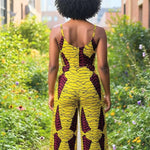 Back view of African print jumpsuit dress showing zipper from top center back to hip”