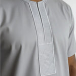 African buba embroidery applique with distinct oval shape and decorative stitching.