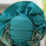 Stylish Dupsie's African pre-tied head wrap displayed for a fashion event.