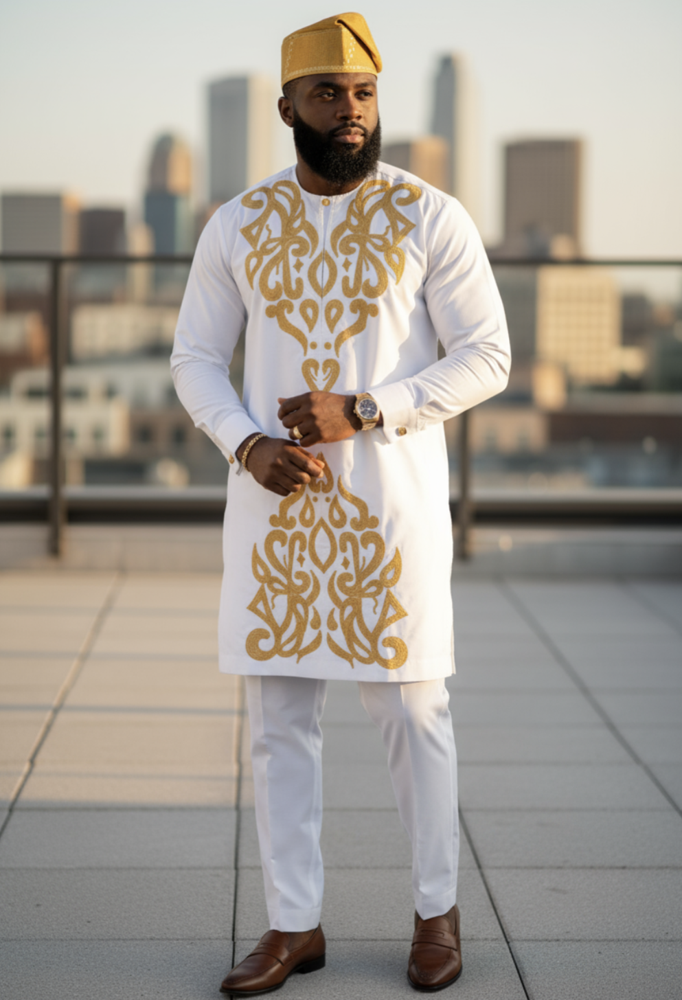 Elegant African fashion pantsuit for men featuring gold embroidery.