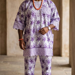 Elegant African wedding attire for grooms.