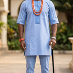  African Joromi embroidered Agbada for men in elegant light purple and light blue African fashion.