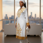 Traditional African pantsuit set featuring a long-sleeved tunic and drawstring pants.