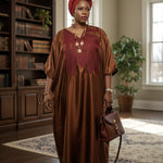 Rust African Satin Silk dress with red embroidery patterns, luxurious African clothing for women and stylish African fashion for women.