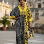 African tie-dye Boubou dress with yellow beaded neckline trim showcasing Nigerian African fashion for women and elegant African clothing style.