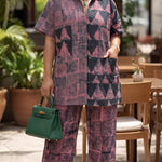 Pink and green African fashion pants suit inspired by elegant color palettes for formal occasions.