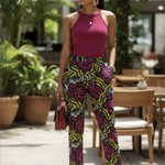 Alina African print pants featuring vibrant yellow, fuchsia pink, black, and off-white colors.

