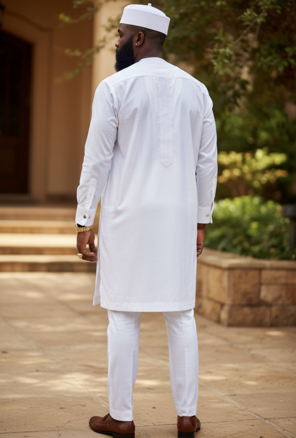 White and gold embroidered Anagh Ensemble by Dupsie's African Fashion.