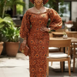 Anofia burnt orange African lace rhinestoned maxi dress for women by Dupsie's African Fashion featuring sequins embroidery, elegant off shoulder sleeves, Nigerian party fashion, African women lace dress.