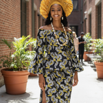 Elegant African clothing set with fitted lace blouse and gold‑accent wrap skirt