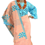 African wedding mother of bride outfit in Peach and Teal Aso Oke with lace blouse, gele, wrap skirt, and stole.