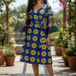 Awoorin Royal-Blue and Yellow Wrap Midi Dress by Dupsie's African fashion showcasing vibrant Ankara fabric.