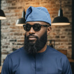 Banjo light-blue Aso Oke fila African hat for men by Dupsie’s African Fashion with navy-blue and silver patterns
