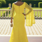 Yellow sequin lace dress with pleated neckline and right-shoulder shawl