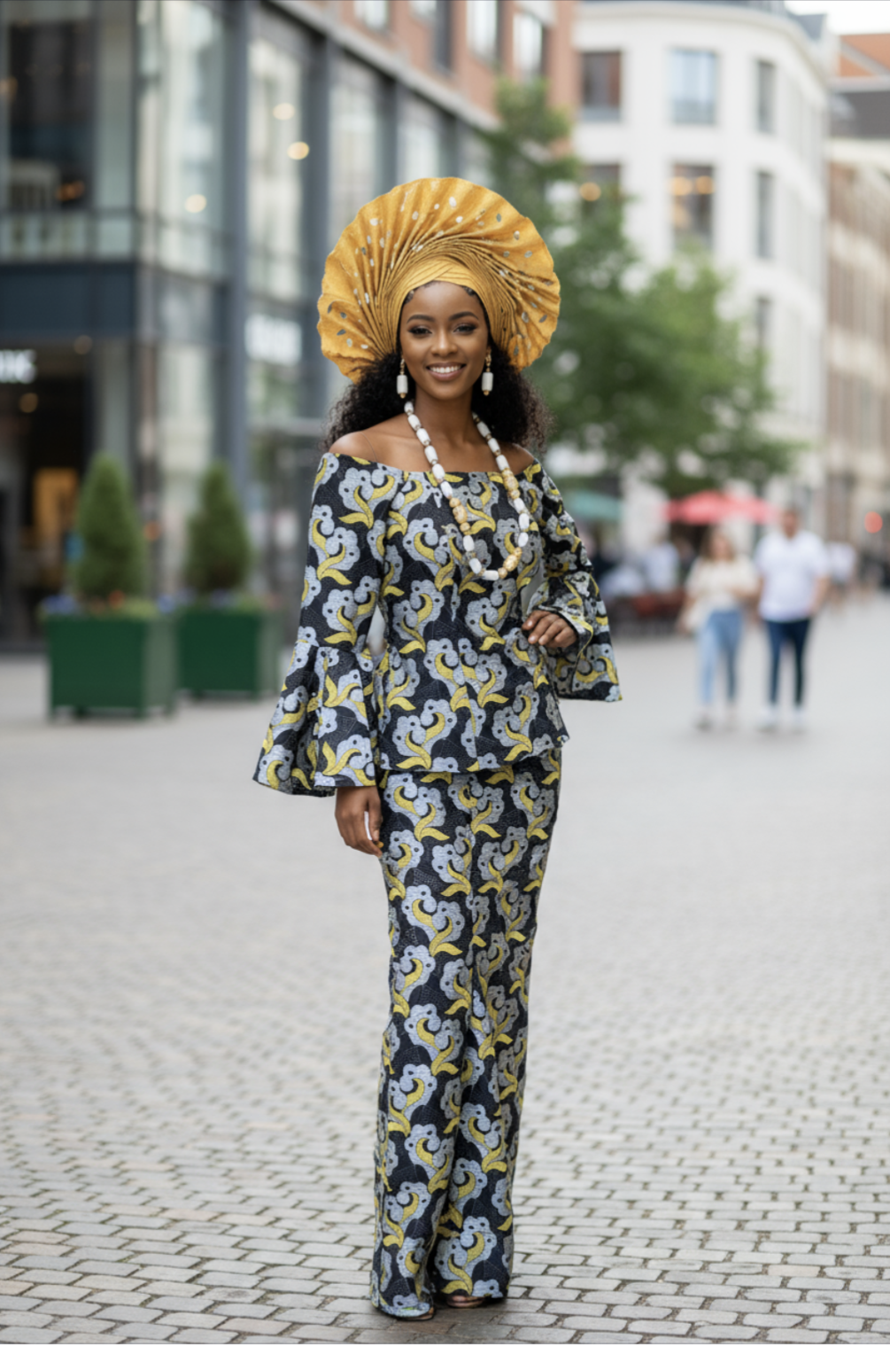 Black, silver and gold African lace top with wrap skirt, flare sleeves by Dupsie’s African Fashion