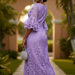 Side profile of rihanna lilac bustier African dress, elegant African lace dress with fitted silhouette by Dupsie’s African clothing brand 