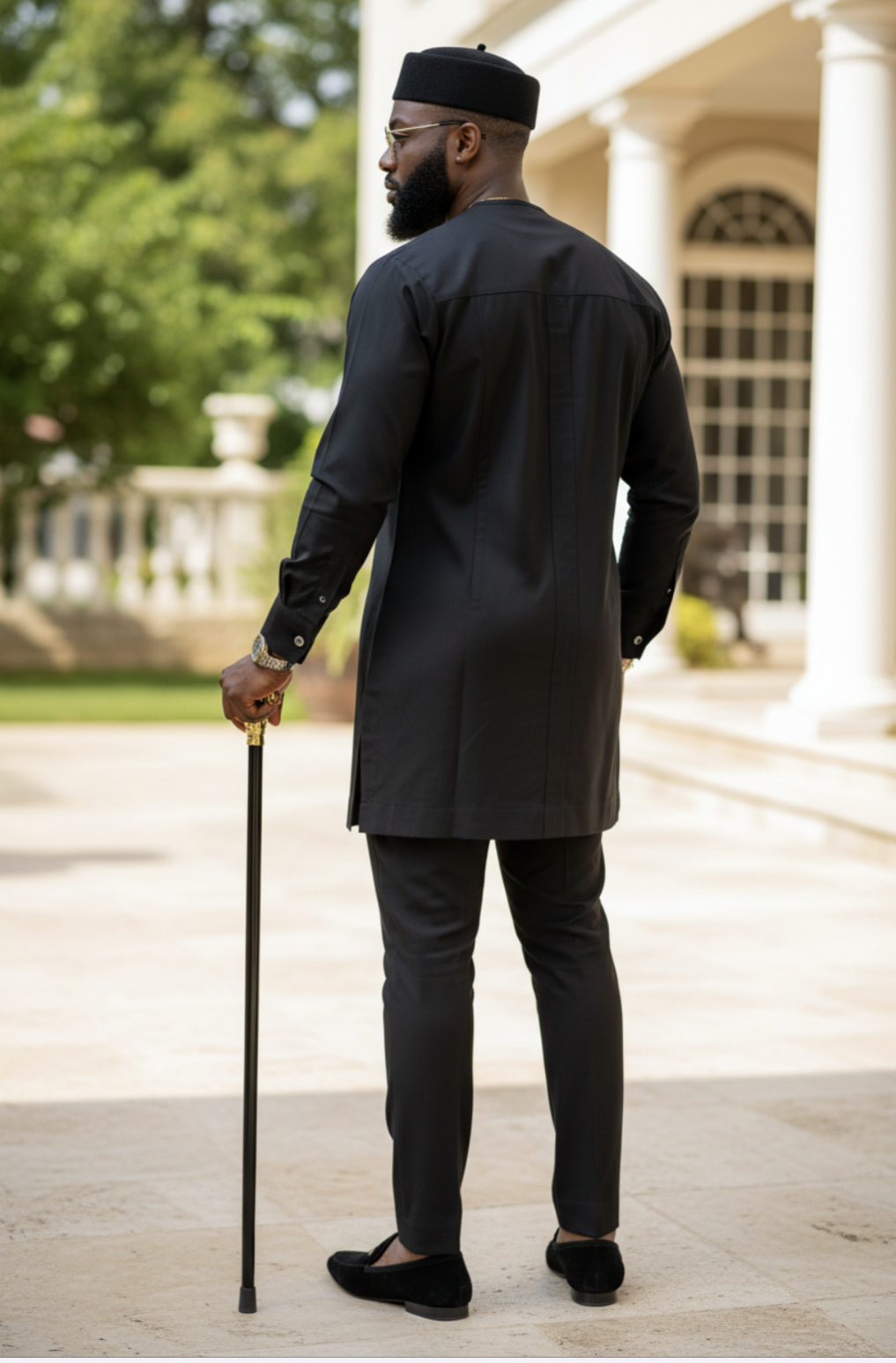 Elegant display of Dupsie's African Fashion Taloju suit designed for men.