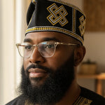 Black handwoven Aso Oke men’s hat “Gah” by Dupsie’s African Fashion, a Nigerian Yoruba fila African hat with gold and silver embroidery for African clothing for men and African weddings.