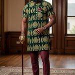 Nigerian Isiagu shirt in rich green velvet adorned with gold patterns, ideal for cultural celebrations and stylish outings
