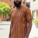 Close-up of the embroidery on a short sleeve African print Kente Dashiki.