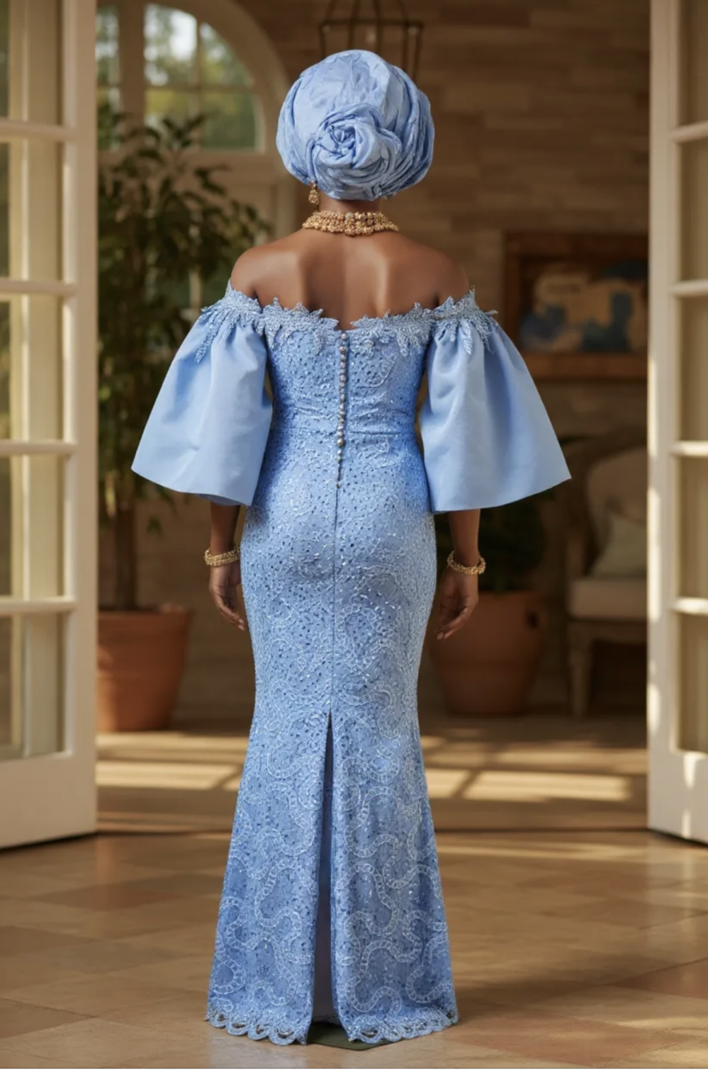 Back view of light‑blue African lace dress with invisible zipper and center lower‑back slit, designed by Dupsie’s African Fashion