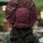 Lazercut wine Aso Oke pre‑tied head wrap Autogele “Bose” Nigerian wedding hat for women by Dupsie’s African Fashion styled with elegant African attire.