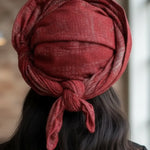 Close-up of Dupsie’s Red and Silver Damask Aso Oke Autogele, perfect for Nigerian weddings.