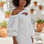 Side view showing smocked waist and sculpted fit on ivory off-white African dress