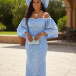 Light‑blue off‑shoulder sequin lace bustier African dress with cape sleeves by Dupsie’s African Fashion, elegant for weddings and Aso Ebi