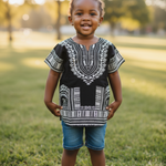 Pullover top with elegant black and white print, perfect for special occasions