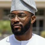 Pataki Silver Embroidered Aso Oke Hat showcasing traditional African craftsmanship.