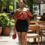 Women’s African print puff-sleeve crop top by Dupsie’s African Fashion with colorful red, yellow, and green fabric.