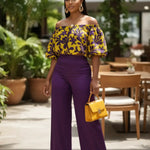 Model wearing a yellow and purple African print off-the-shoulder crop top from Dupsie’s African Fashion.
