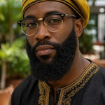 Gold and black African hat for men styled for Nigerian men’s fashion and African attire