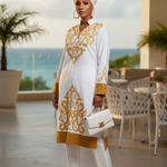 Gold embroidered detail on a white dashiki-style tunic from the LaToya ensemble.