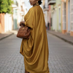 Gold silk African dress with front slit, luxurious African fashion for women and formal African clothing for parties