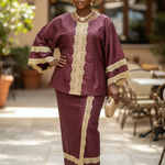 Burgundy lace trimmed wrap skirt complementing the African brocade top