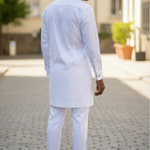 Back view of the ivory African Senator set with smooth drape and structured hem for a polished finish.