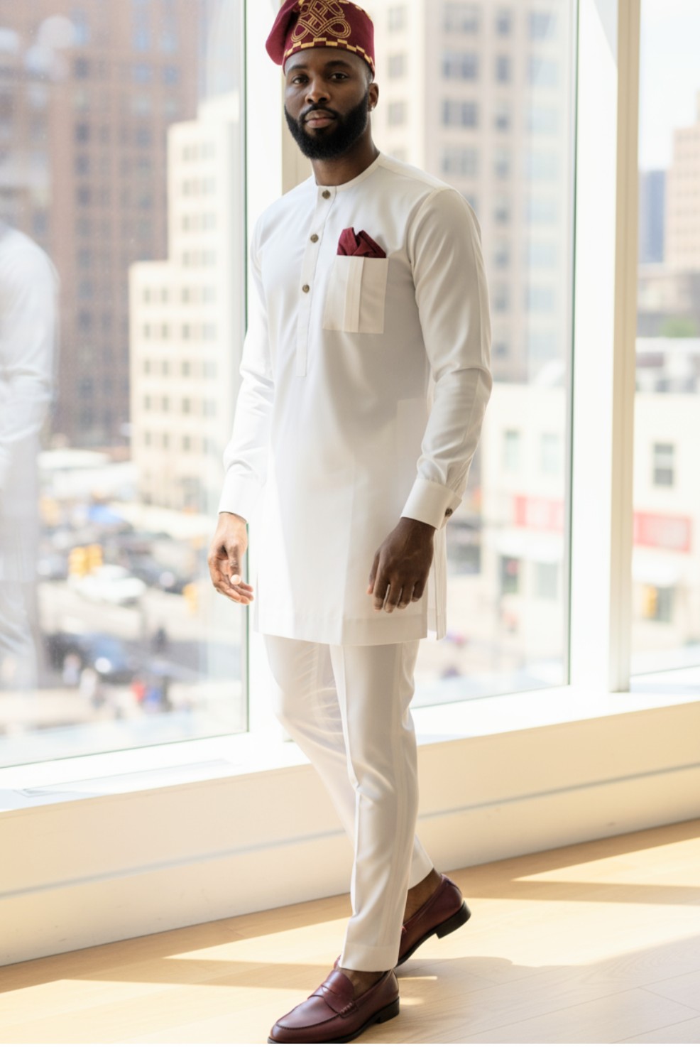 Ivory off‑white African Senator Dashiki set for men by Dupsie’s African Fashion, slim‑fit top and drawstring pants, front view