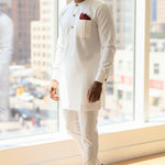 Ivory off‑white African Senator Dashiki set for men by Dupsie’s African Fashion, slim‑fit top and drawstring pants, front view