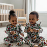 Kibonen multicolored African print footed onesie for toddlers by Dupsie's African Fashion featuring vibrant Ankara-inspired patterns.