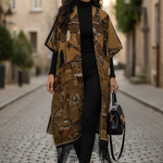 Brown, black, and beige African mud cloth kimono dress showcasing intricate village patterns.