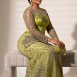 Lime green African custom dress with heavily beaded sheer sleeves and satin bodice