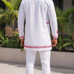Long sleeve embroidered African Dashiki shirt for men in white with red Nigerian embroidery.