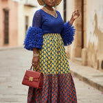 Royal blue lace bodice African dress by Dupsie's with rhinestones and multicolored print.