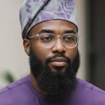 Nigerian Aso Oke Yoruba hat in grey with purple patterns called Poju, a premium African clothing for men accessory and African fashion statement piece.